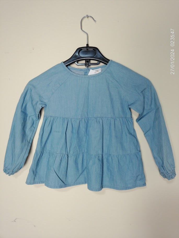 Blusita manga larga celeste con botones