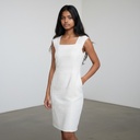 Vestido sin manga blanca Texturizada talle S con bordado enfrente y cierre detras Nikibiki