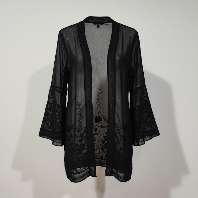 [1672] Camisa Eneache manga corta negro Transparente talle XS Escote V. Con bolados en el escote y mangas