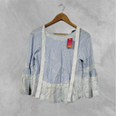 Blusa Zara con manga celeste y blanco a rayas talle xs tiras en los hombros, encaje