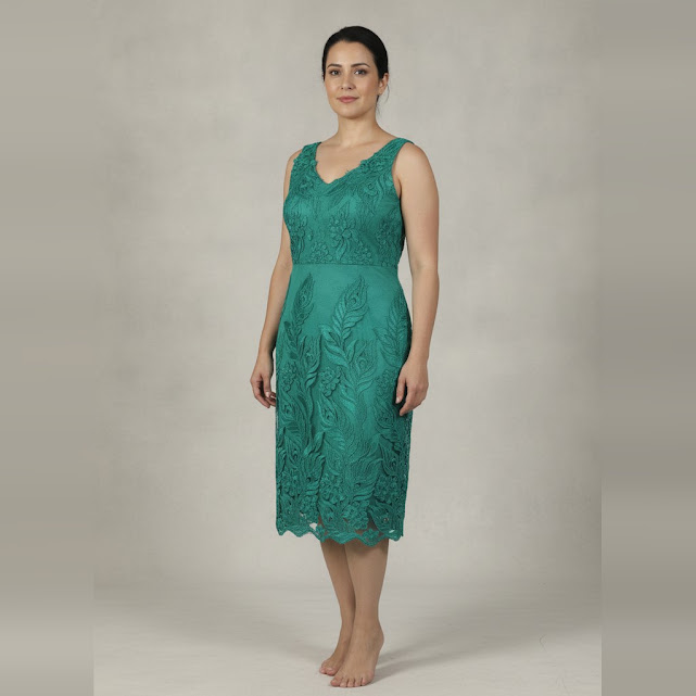 Vestido corto verde bordado talle G con detalles de flores boradadas