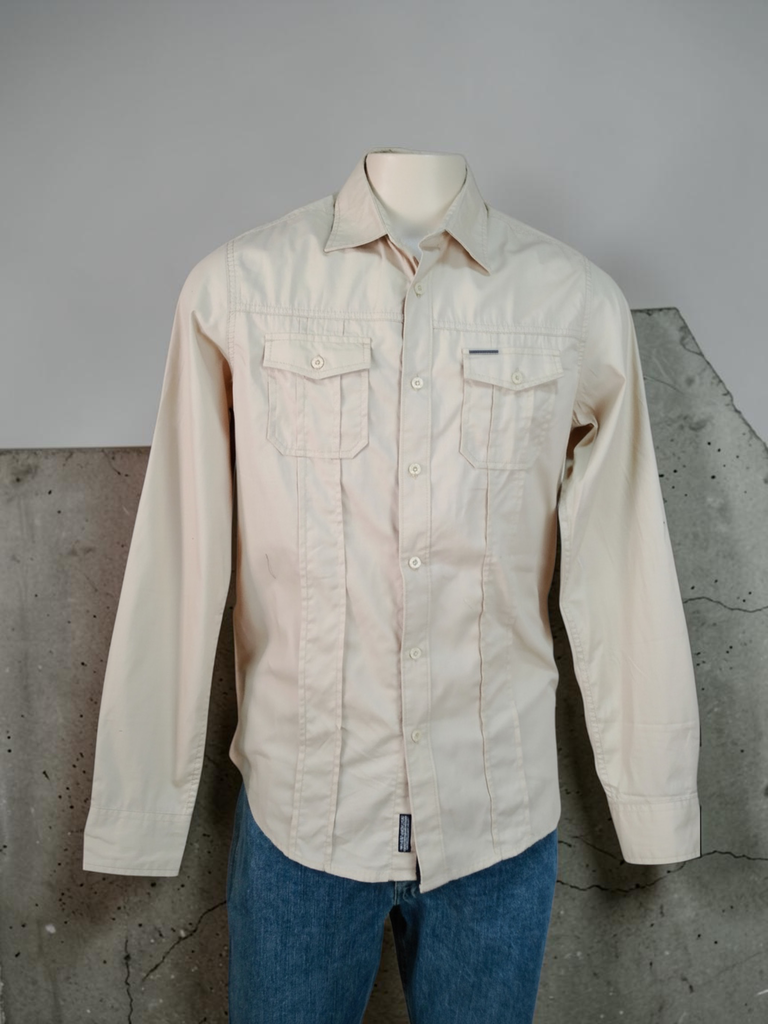 Camisa nude manga larga con bolsillos